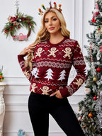 Woman in a festive red sweater with holiday motifs, posing with her hand on her hip.