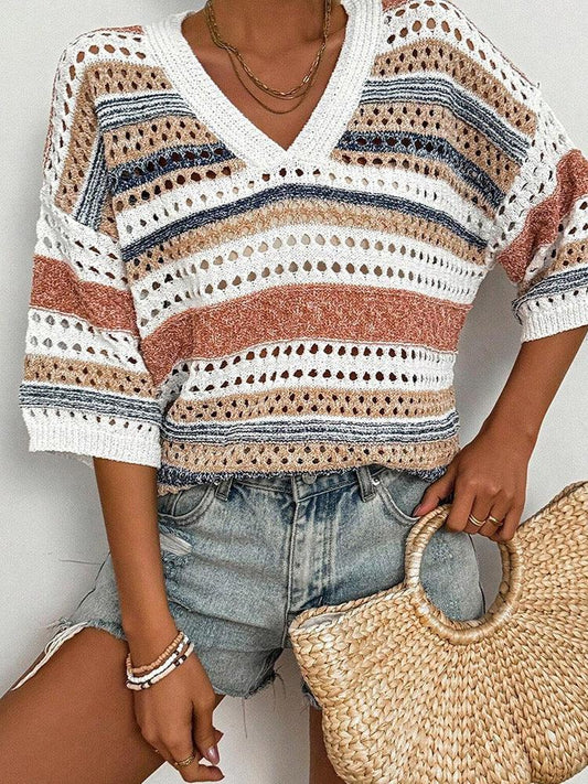 Close-up of the striped, open-knit sweater with a v-neckline and short sleeves.