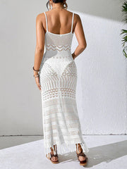 Back view of a woman wearing a white crochet maxi dress