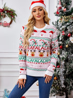 Woman in a festive pink knitted sweater with holiday motifs, posing with a large candy cane prop