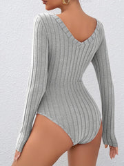 Back view of a grey ribbed long-sleeve bodysuit with a deep V-back.