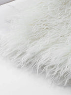 Detailed view of white shaggy faux fur