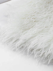 Detailed view of white shaggy faux fur