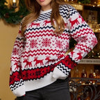 Woman wearing a white and red Christmas sweater with a reindeer and snowflake pattern.
