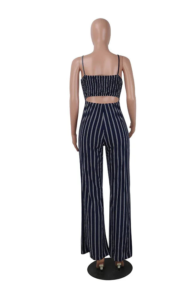 Mannequin wearing a navy and white striped jumpsuit with a tie-front detail and wide legs, back view.