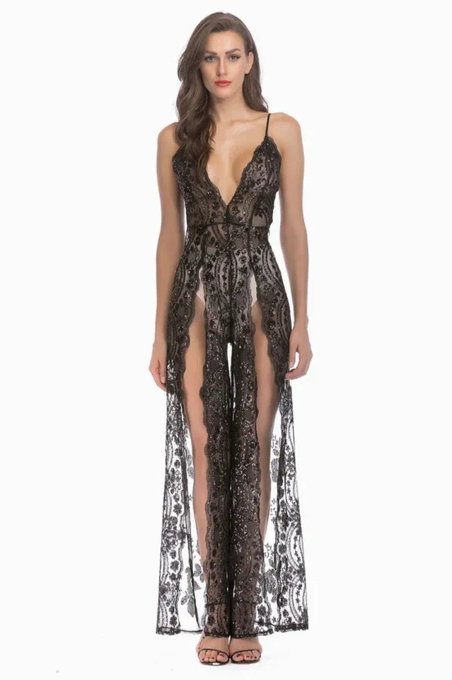 Full-length view of a woman in a black sequined lace maxi dress with high slits.