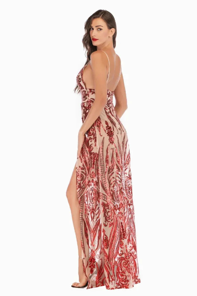 Side view of a woman in a sequined evening gown, showcasing the high slit and open back.