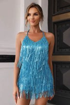 woman wearing a blue sequined fringe halter mini dress from the front
