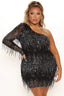 Model wearing a black sequined one-shoulder mini dress with fringe detailing.