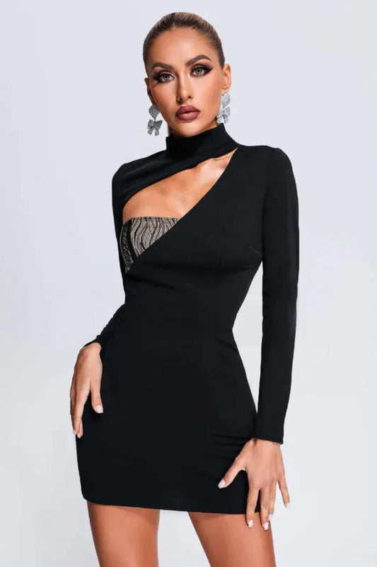 woman wearing a black mini dress with an asymmetrical cut-out and mock neck