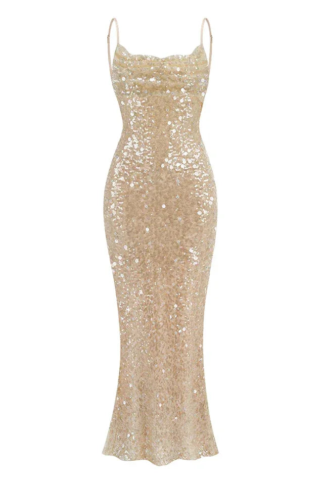 A full-length, sequined mermaid dress with a cowl neckline and thin straps, shown on a mannequin.