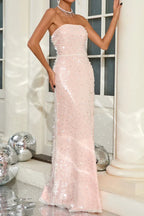 Side view of a model wearing a pink strapless sequined and beaded floor-length gown.