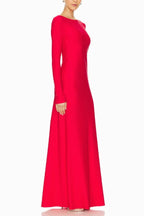 Side view of a red long sleeve sheath gown