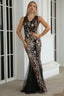 Woman wearing a black and gold sequined sleeveless mermaid evening gown.