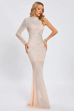 model posing in a sparkly, floor-length dress with a one-shoulder design