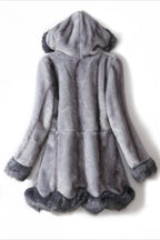 Back view of a grey faux fur coat with a hood