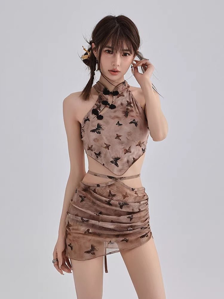 Woman wearing a butterfly print halter top and a matching mini skirt