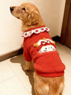 Side view of a golden retriever dog in a red fleece sweater