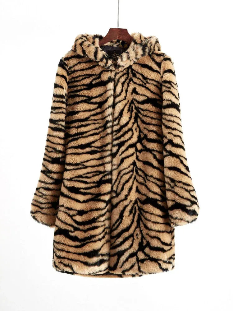 Hooded faux fur tiger print long coat hanging on a hanger.