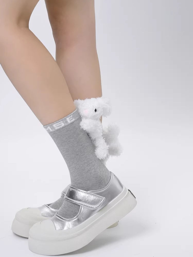 Black cotton crew socks with a 3D fluffy white bunny embellishment and white embroidered lettering on the ribbed cuff. - View 9 | TEVQA