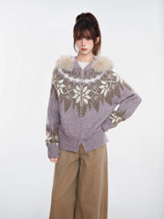 Woman wearing a purple and white Fair Isle knit zip-up cardigan with a faux fur trim hood and tan wide-leg pants