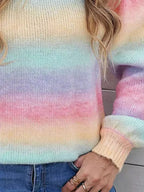 Close-up of the rainbow gradient knit sweater showing the texture and colors.