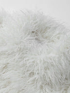 Close-up of white shaggy faux fur texture