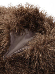 Close-up of brown shaggy faux fur collar with a satin lining