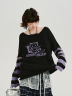 Model adjusting the sweater, revealing the layering underneath