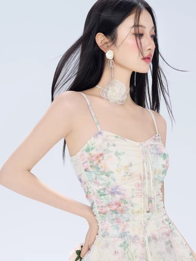 Close-up of the floral print and ruched bodice of a mini dress.