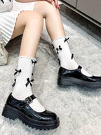 Grey knee high socks with black satin bows and faux pearl embellishments - View 13 | TEVQA