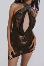 Close-up of the chest area of a distressed knit halter mini dress, showing the open cutout and halter neckline