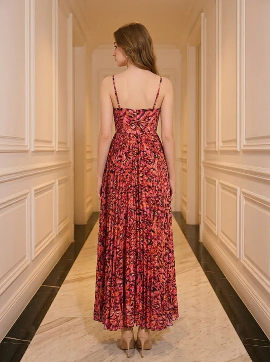 Back view of a woman in a red floral print maxi dress