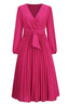 Front view of a long-sleeved pink wrap dress with a pleated skirt and a self-tie belt
