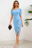 woman in blue sheath dress with ruffled skirt and slit
